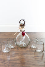 Load image into Gallery viewer, Hammered Glass Decanter with Iron Stopper and four Matching Glasses.
