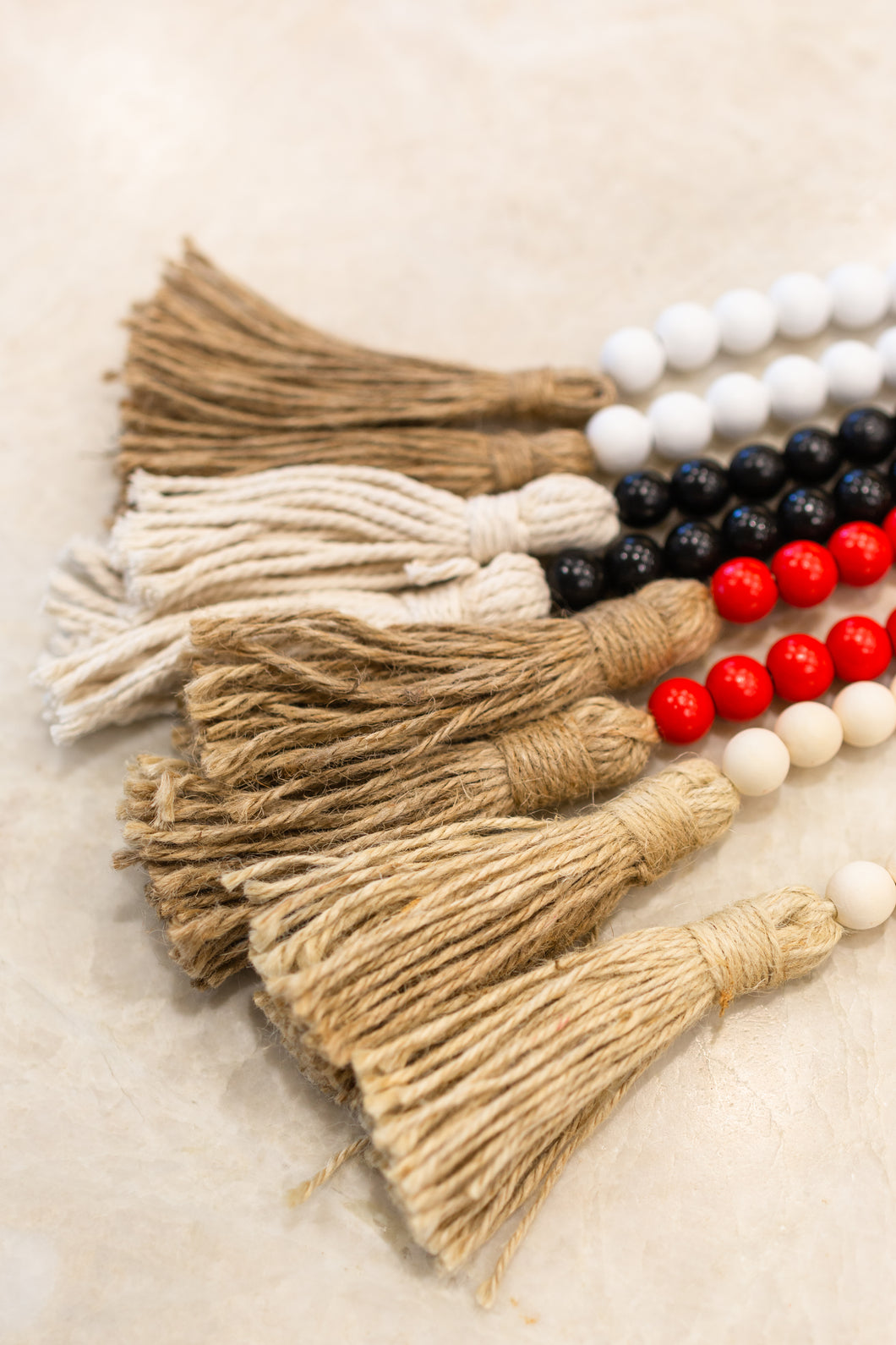 black wood bead garland with tassels